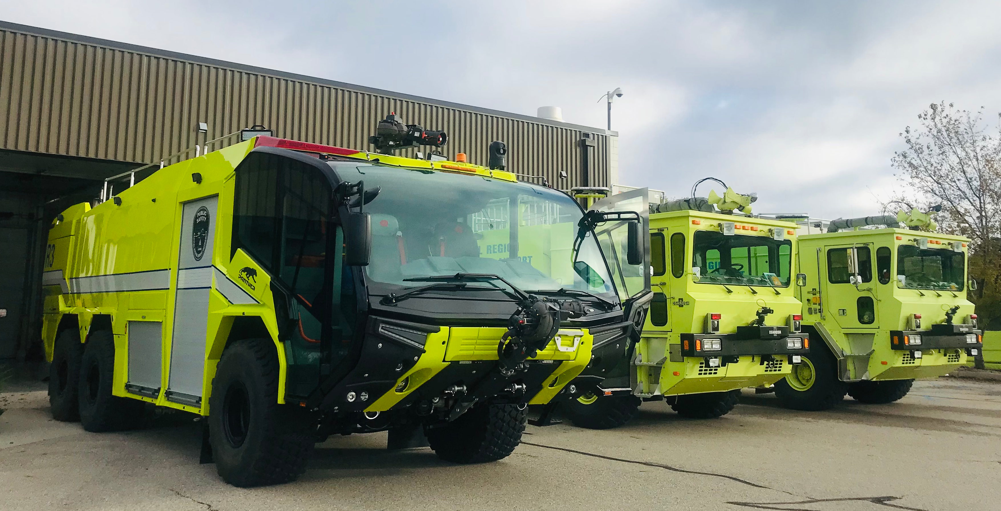 Three Lansing airport fire trucks