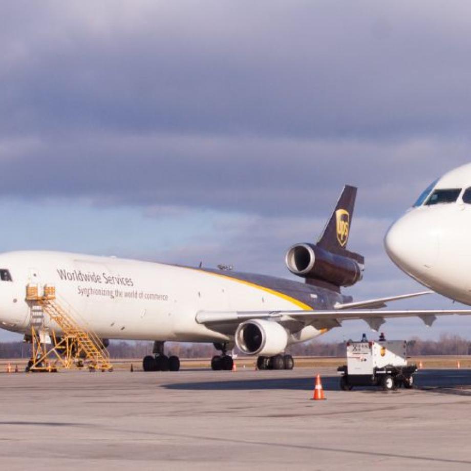 cargo airplanes sitting on tarmac